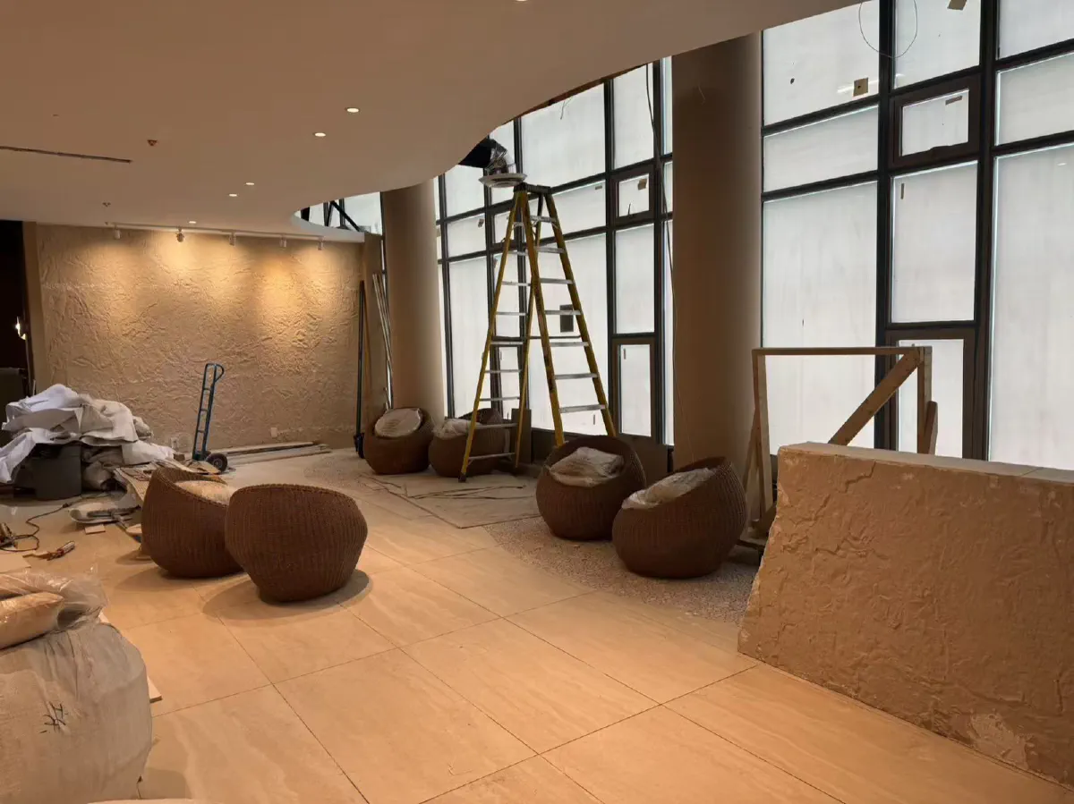 The lounge, wrapped in floor-to-ceiling windows