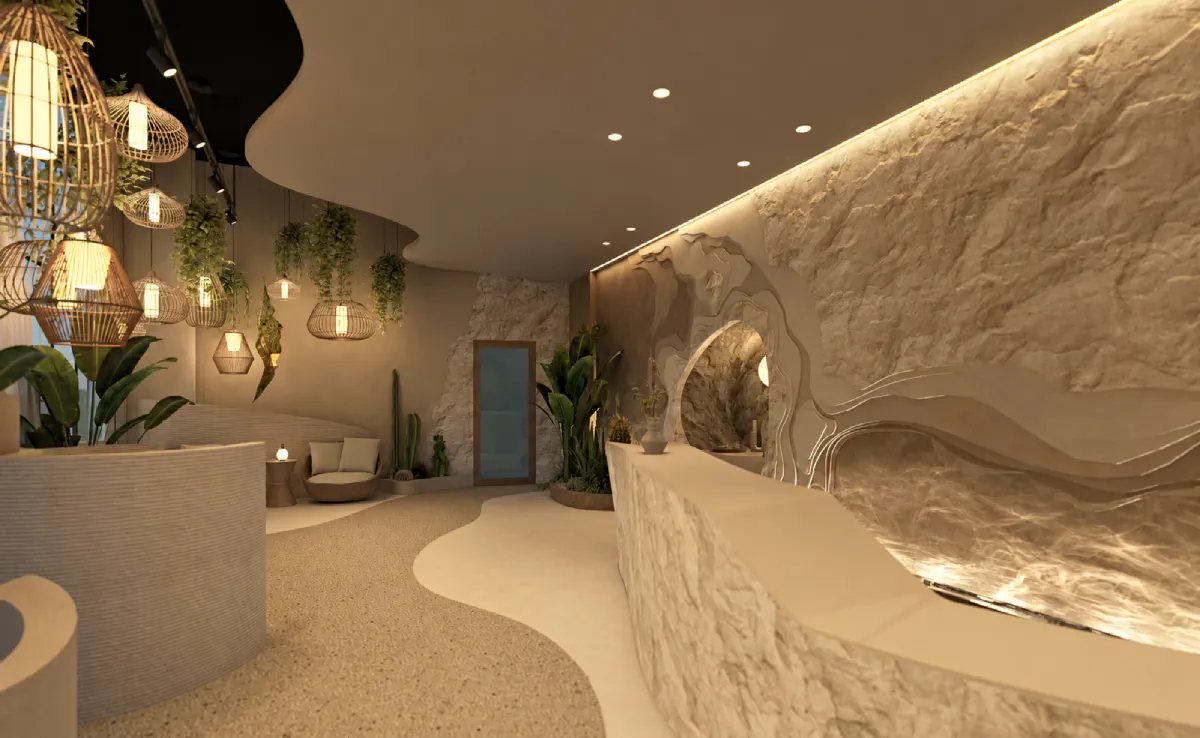 Rendering of the Qove reception: a sculpted stone desk, rattan lanterns and plants under warm light